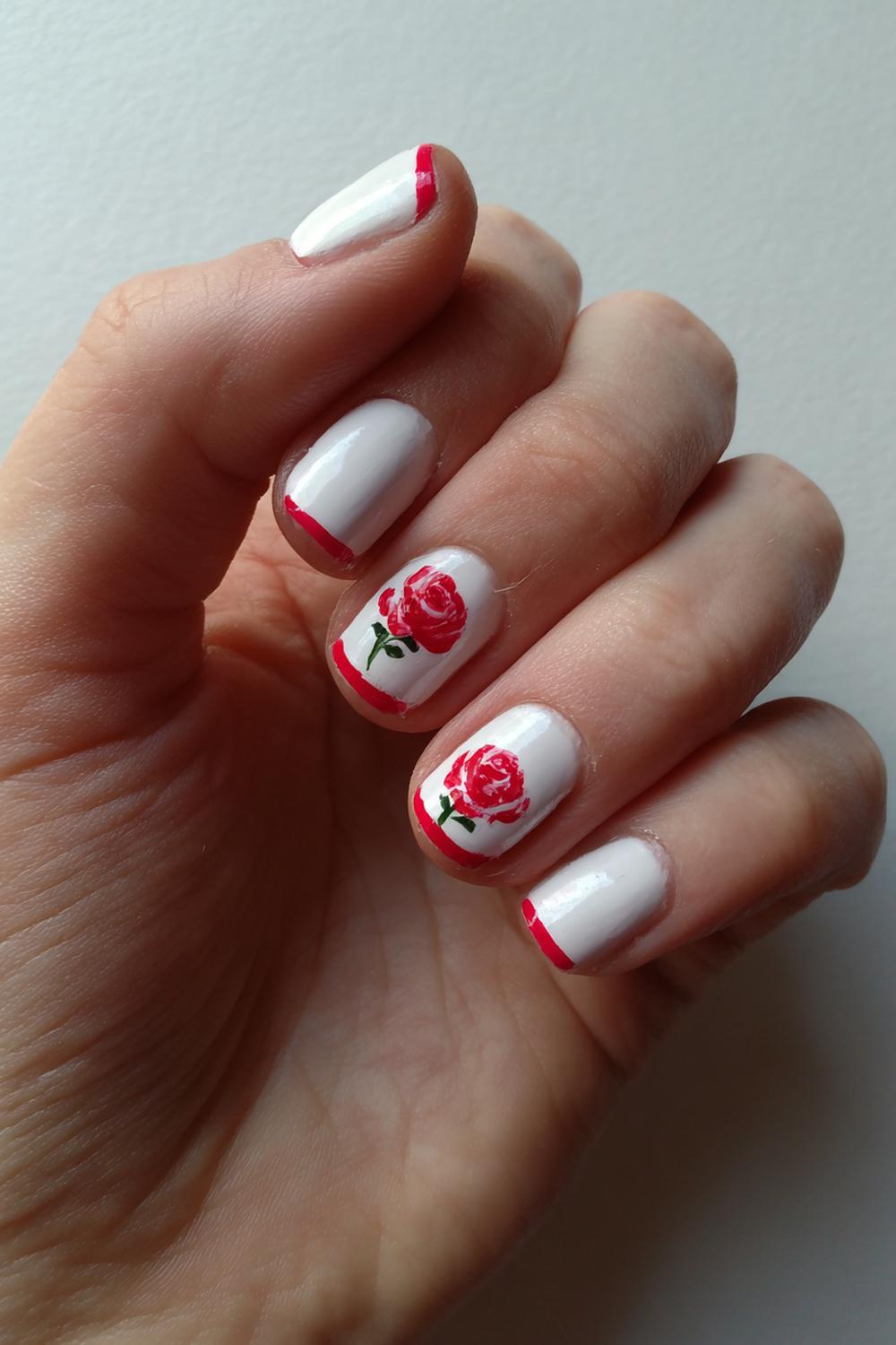 30. Nagels valentijn met witte basis en rode handgetekende roos